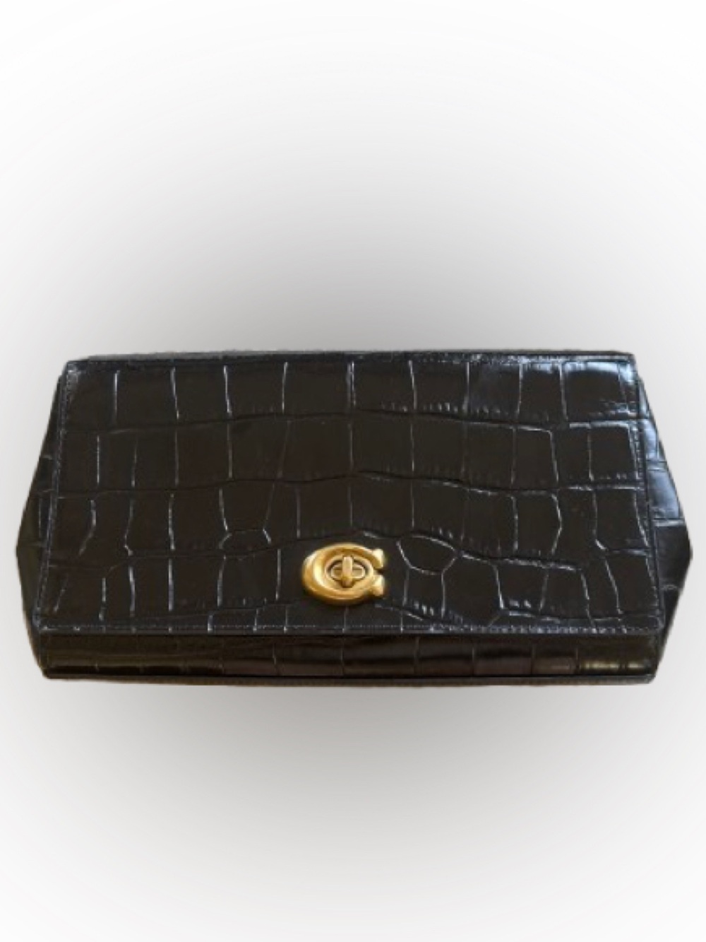 Coach croc-embossed leather clutch in very good condition